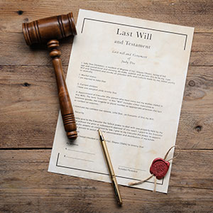 Legal Wills & Trusts Document with Gavel and Pen